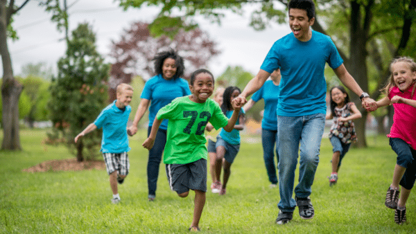 Children and adults playing outside